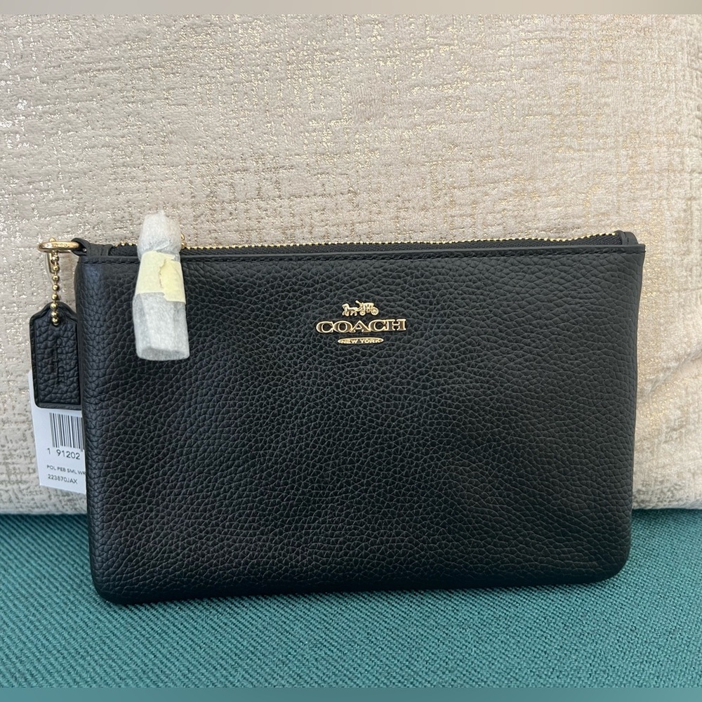 COACH zipper wallet. New with tags.